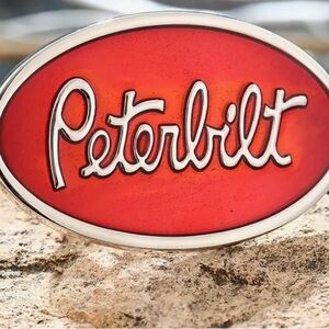 1 beautiful red Peterbilt belt buckle. Unisex